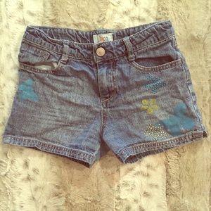 Denim shorts with butterfly accent